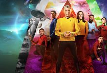 "Star Trek: Strange New Worlds main cast, featuring Captain Pike and the Enterprise crew in colorful uniforms, standing against a vibrant, multi-colored backdrop representing space exploration."